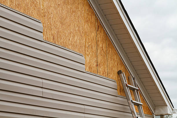 Professional Emergency Siding Repair technician working in Mulberry, IN